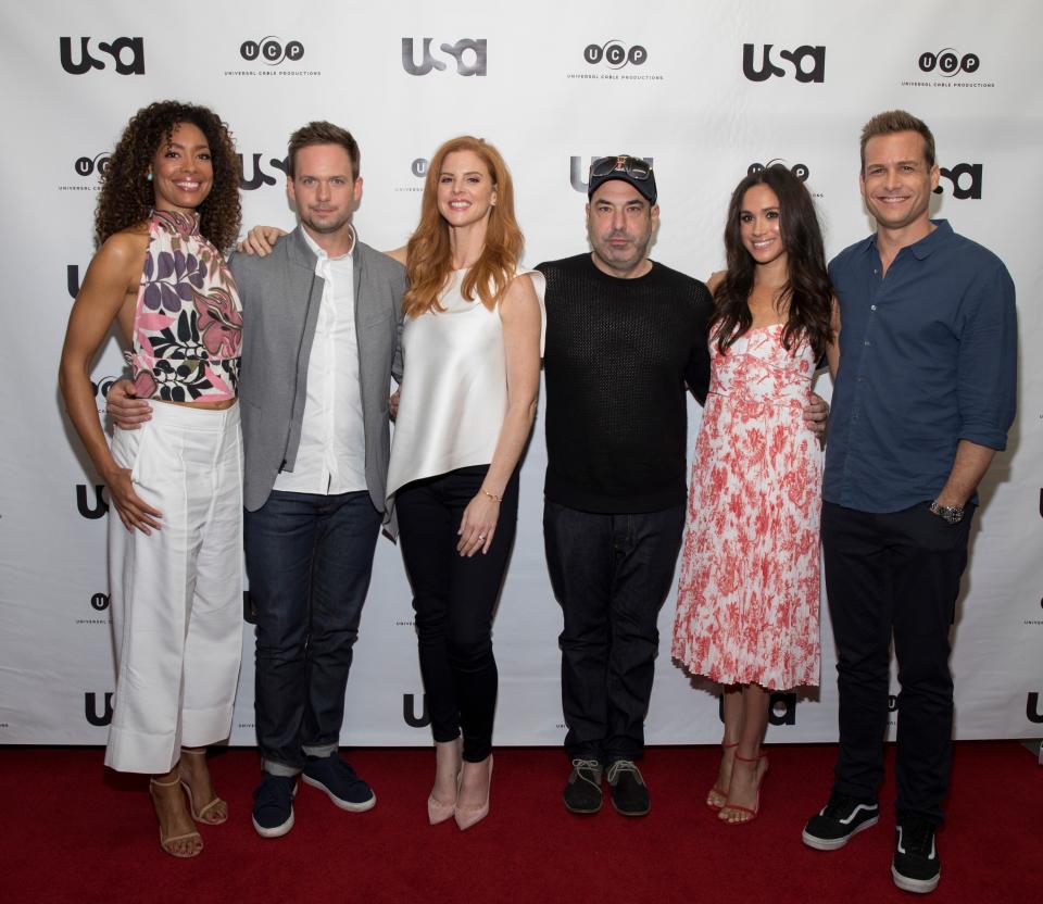 Gina Torres, Patrick J. Adams, Sarah Rafferty, Rick Hoffman, Meghan Markle, and Gabriel Macht.