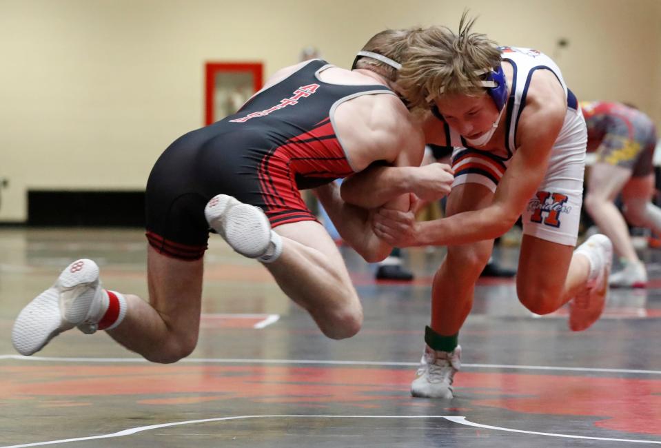 Harrison Carter Heriges wrestles Attica Boden Rice during the IHSAA wrestling sectionals meet, Saturday, Jan. 27, 2024, at Lafayette Jeff High School in Lafayette, Ind.