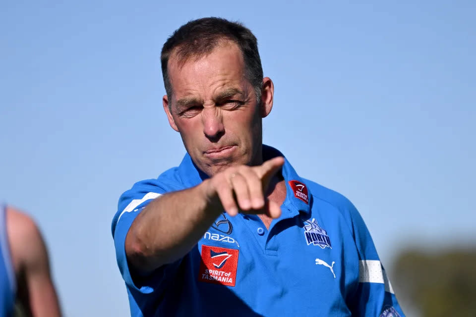 Kangaroos coach Alastair Clarkson talks through a training drill during a pre-season camp. Pic: Getty
