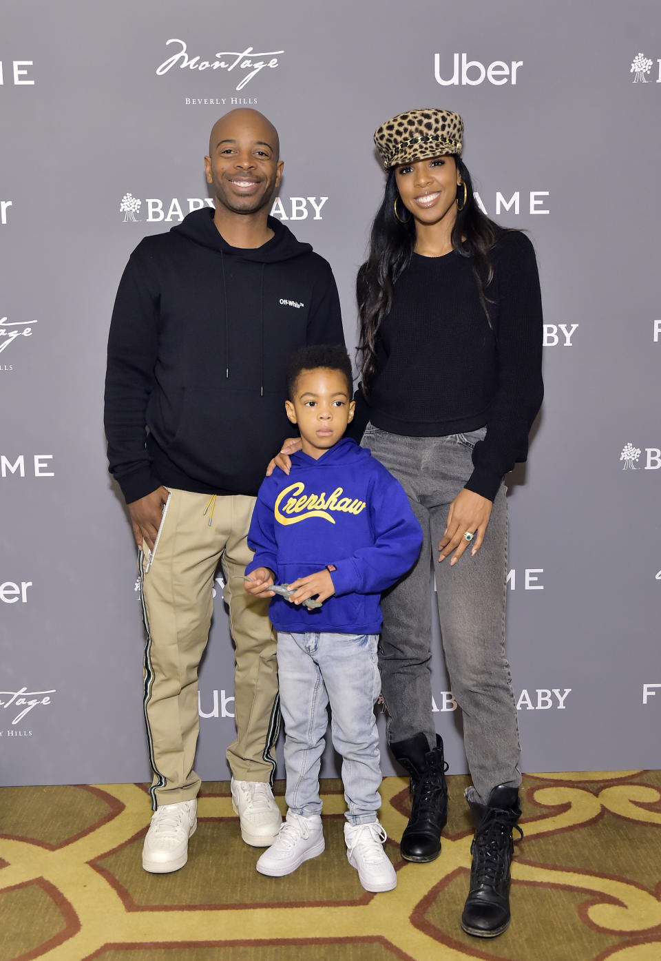 Tim Weatherspoon, Titan Jewell Weatherspoon and Kelly Rowland attend The Baby2Baby Holiday Party Presented By FRAME And Uber at Montage Beverly Hills on December 15, 2019 in Beverly Hills, California. (Photo by Stefanie Keenan/Getty Images for Baby2Baby)