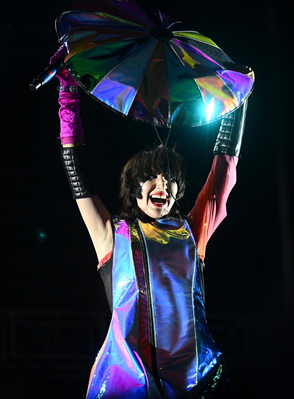 <p>Karen O of The Yeah Yeah Yeahs has some fun on stage during Riot Fest 2022 at Douglass Park in Chicago on Sept. 18.</p>