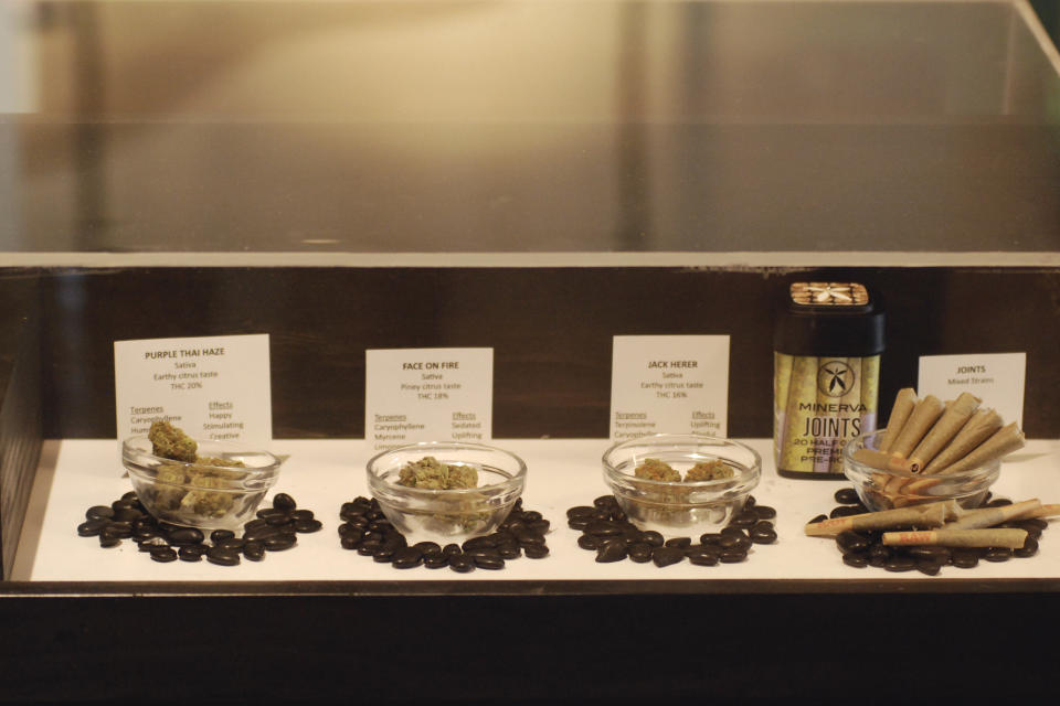 Marijuana display cases are stocked in downtown Santa Fe, N.M., on Tuesday, March 29, 2022, in preparation for the opening of New Mexico's regulated market for recreational cannabis. At midnight on Friday, April 1, 2022, it becomes legal for anyone 21 and older to purchase and possess up to 2 ounces (57 grams) of marijuana for personal use -- enough to roll about 60 joints or cigarettes. New Mexico is among 18 states that have broadly legalized marijuana. (AP Photo/Morgan Lee)