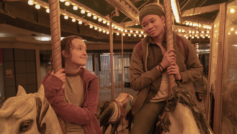 Ellie and Riley ride a mall's carousel on The Last of Us