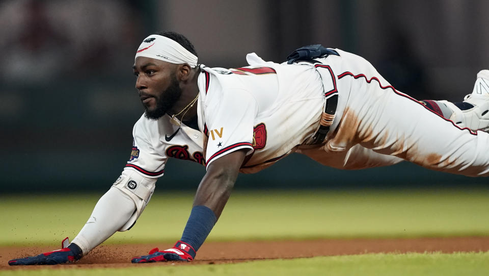 Atlanta Braves' Michael Harris II slides into second base with a double during the seventh inning of the team's baseball game against the Oakland Athletics on Wednesday, June 8, 2022, in Atlanta. (AP Photo/John Bazemore)