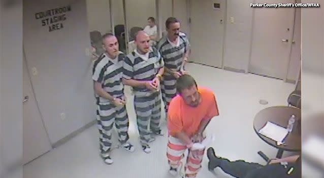 A group of at least eight inmates noticed a lone guard slumped in his chair, so they broke from their cell to get help. Source: Parker County Sheriff's Office