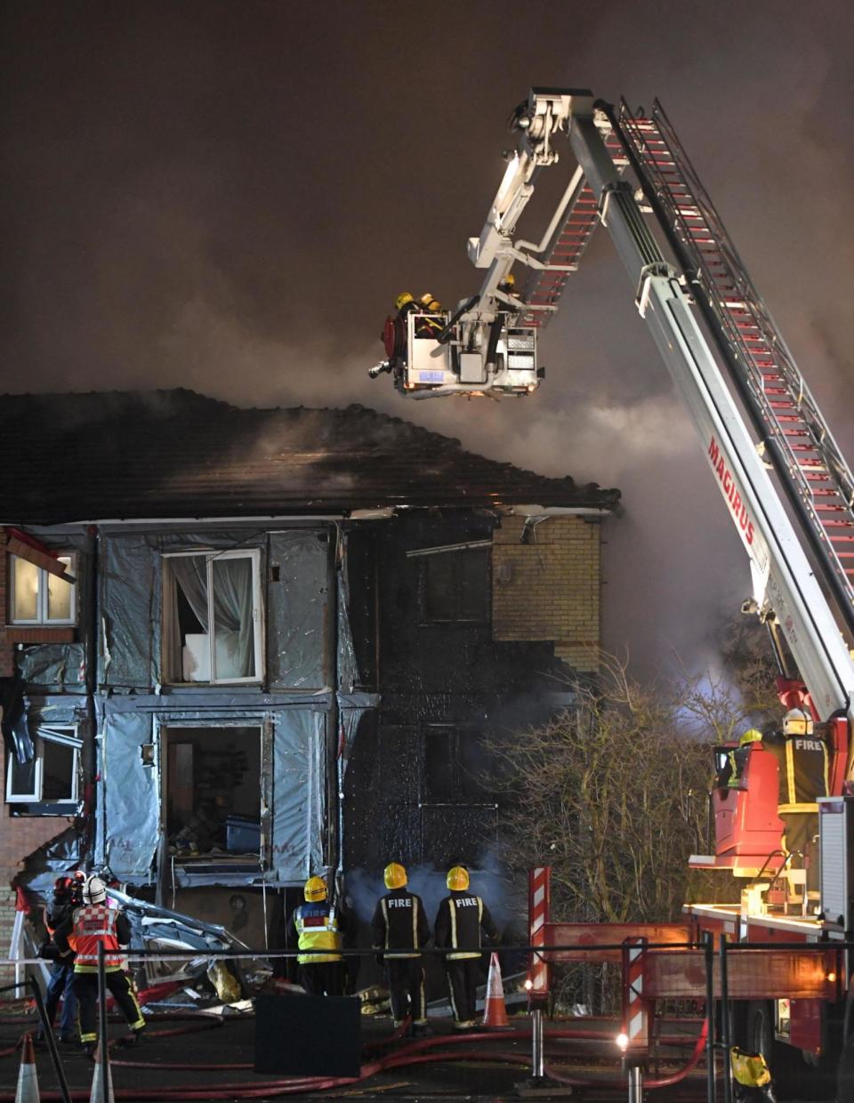 Emergency services at the scene of the explosion (PA)