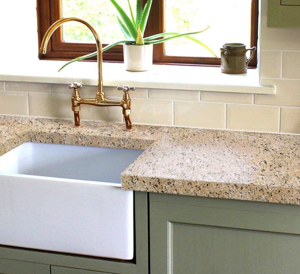 Give your countertops a beautiful granite look that'll make your space feel super chic and modern. You won't have to spend a fortune to basically replace your countertops.<br /><br /><strong>Promising review:</strong> "I found out about this kit a few weeks ago. I redid my mother's countertops first and was so pleased with the results, I bought a second kit and did mine this weekend. I am not a crafty person, so if I can do it, anyone can. Just be sure you follow the step-by-step instructions on the included DVD. They came out great!" &mdash; <a href="https://amzn.to/3e9slzZ" target="_blank" rel="nofollow noopener noreferrer" data-skimlinks-tracking="5723569" data-vars-affiliate="Amazon" data-vars-href="https://www.amazon.com/gp/customer-reviews/R1DC53367Q6ZL0?tag=bfjasmin-20&amp;ascsubtag=5723569%2C13%2C31%2Cmobile_web%2C0%2C0%2C14870774" data-vars-keywords="cleaning,fast fashion" data-vars-link-id="14870774" data-vars-price="" data-vars-product-id="15955948" data-vars-retailers="Amazon">Sarah W. Fallon</a><br /><br /><strong>Get it from Amazon for <a href="https://amzn.to/3glZET9" target="_blank" rel="noopener noreferrer">$79+</a> (available in three colors).</strong>