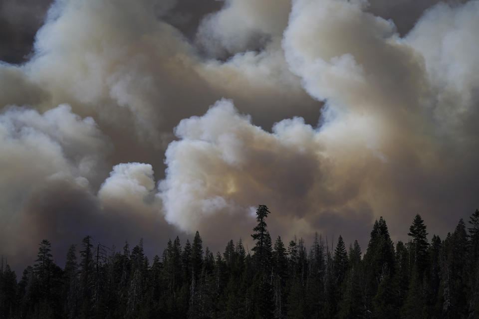 Huge plumes of smoke generated by the Caldor Fire are seen from Kirkwood, Calif., Wednesday, Sept. 1, 2021. (AP Photo/Jae C. Hong)