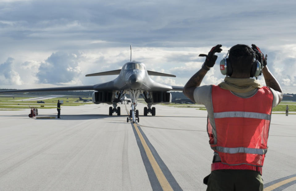 FILE - In this file photo provided by the U.S.Air Force, taken July 26, 2017, a U.S. Air Force B-1B Lancer arrives at Andersen Air Force Base, Guam. President Donald Trump is raising a large chunk of the money for his border wall with Mexico by deferring several large military construction projects slated for the strategically important Pacific outpost of Guam. This may disrupt plans to move Marines to Guam from Japan and to modernize important munitions storage for the Air Force. About 7% of the funds for the $3.6 billion wall are being diverted from eight projects in U.S. territory. (U.S. Air Force by Tech. Sgt. Richard P. Ebensberger via The AP, File)
