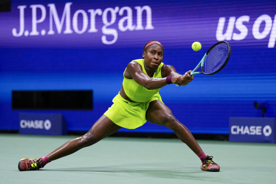 Coco Gauff, of the United States, returns a shot to Karolina Muchova, of the Czech Republic, during the women's singles semifinals of the U.S. Open tennis championships, Thursday, Sept. 7, 2023, in New York. (AP Photo/Manu Fernandez)