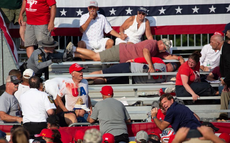 Trump audience hides during shooting