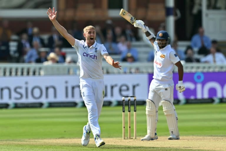 Breakthrough: England fast bowler Olly Stone celebrates his dismissal of Sri Lanka's Dimuth Karunaratne in the second Test at Lord's (Glyn KIRK)