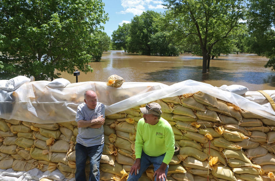 Men taking break from sandbagging