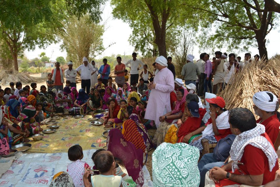 People gathered in a village in India