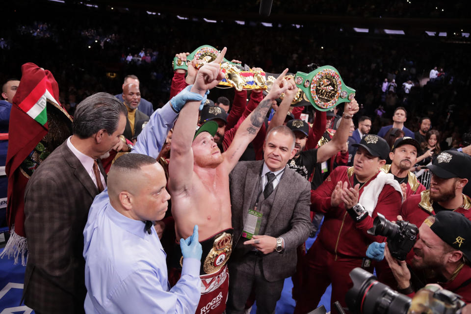 Mexico's Canelo Alvarez celebrates after a WBA super middleweight championship boxing match against England's Rocky Fielding Sunday, Dec. 16, 2018, in New York. Alvarez stopped Fielding in the third round. (AP Photo/Frank Franklin II)