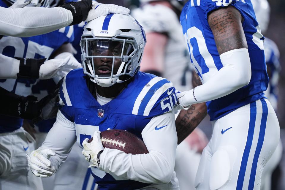 Indianapolis Colts linebacker Segun Olubi (50) celebrates recovering a Philadelphia Eagles fumble during the first half of an NFL preseason football game Thursday, Aug. 24, 2023, in Philadelphia. (AP Photo/Matt Rourke)