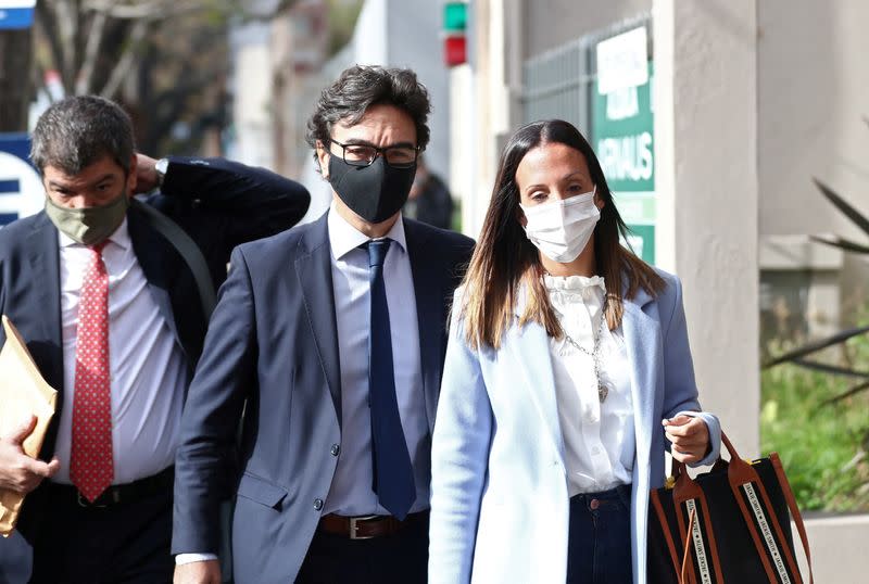 FILE PHOTO: Agustina Cosachov, psychiatrist of late Argentine soccer legend Diego Armando Maradona arrives to a prosecutor's office in San Isidro, accompanied by her lawyer, Vadim Mischanchuk, in Buenos Aires