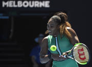 United States' Serena Williams makes a backhand return to Ukraine's Dayana Yastremska during their third round match at the Australian Open tennis championships in Melbourne, Australia, Saturday, Jan. 19, 2019. (AP Photo/Andy Brownbill)