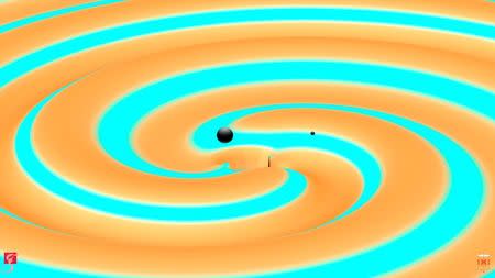 An artist rendition shows two black holes 14 and 8 times the mass of the sun (L-R), just moments before they collided and merged to form a new black hole 21 times the mass of the sun in this image released on June 15, 2016. Courtesy T. Dietrich and R. Haas/Max Planck Institute for Gravitational Physics/Handout via REUTERS