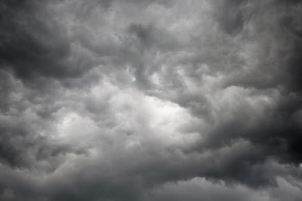 Dark storm sky with light patch in the center