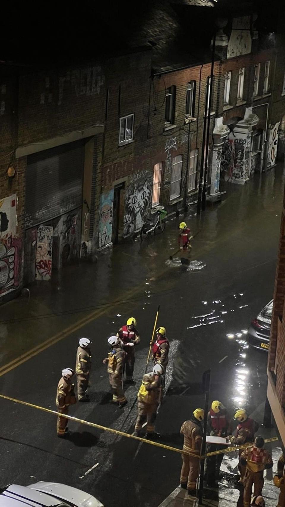 Hackney Wick in east London flooded in the wet weather on Thursday (Simon Goode)