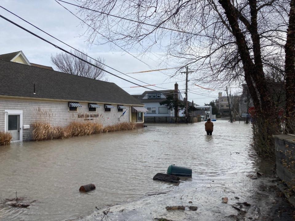 "Flood water is not something you want in your house or business," East End Market owner Oriana Conklin said of the Dec. 23 wind and rain storm that swept across Cape Cod. The intersection of Bradford and Howland streets on the east side of Provincetown was flooded including the East End Market, on the left.