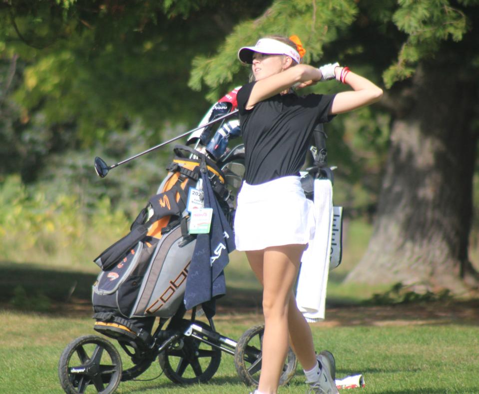Cheboygan senior Katie Maybank watches where her approach shot goes on the 10th hole at the Cheboygan girls golf invitational at the Cheboygan Golf & Country Club on Monday. Maybank earned individual medalist honors for a second consecutive meet.