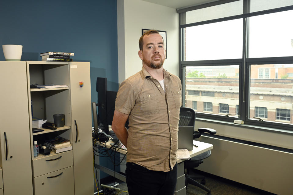 Brad Bottoms, a data scientist at the Center for Social Solutions at the University of Michigan, stands in his office in Ann Arbor, Mich., Monday, July 22, 2024. (AP Photo/Jose Juarez)