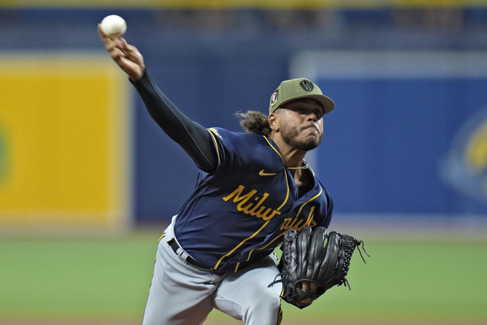 Milwaukee Brewers starting pitcher Freddy Peralta delivers to the Tampa Bay Rays during the first inning of a baseball game Sunday, May 21, 2023, in St. Petersburg, Fla. (AP Photo/Chris O'Meara)