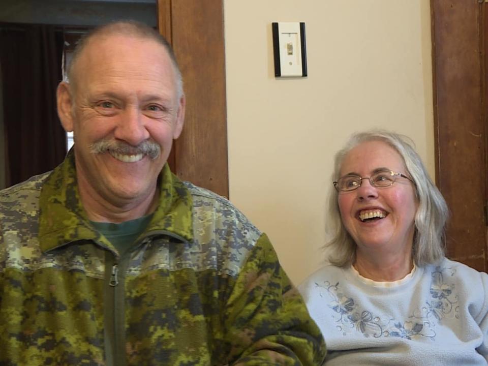 Ron Christie, with his wife Irene in 2017, was well known in his community as a clown, musician, volunteer and woodworker.   (Bridget Yard/CBC - image credit)