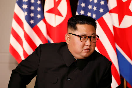 FILE PHOTO: North Korea's leader Kim Jong Un looks at U.S. President Donald Trump before their bilateral meeting at the Capella Hotel on Sentosa island in Singapore June 12, 2018. REUTERS/Jonathan Ernst