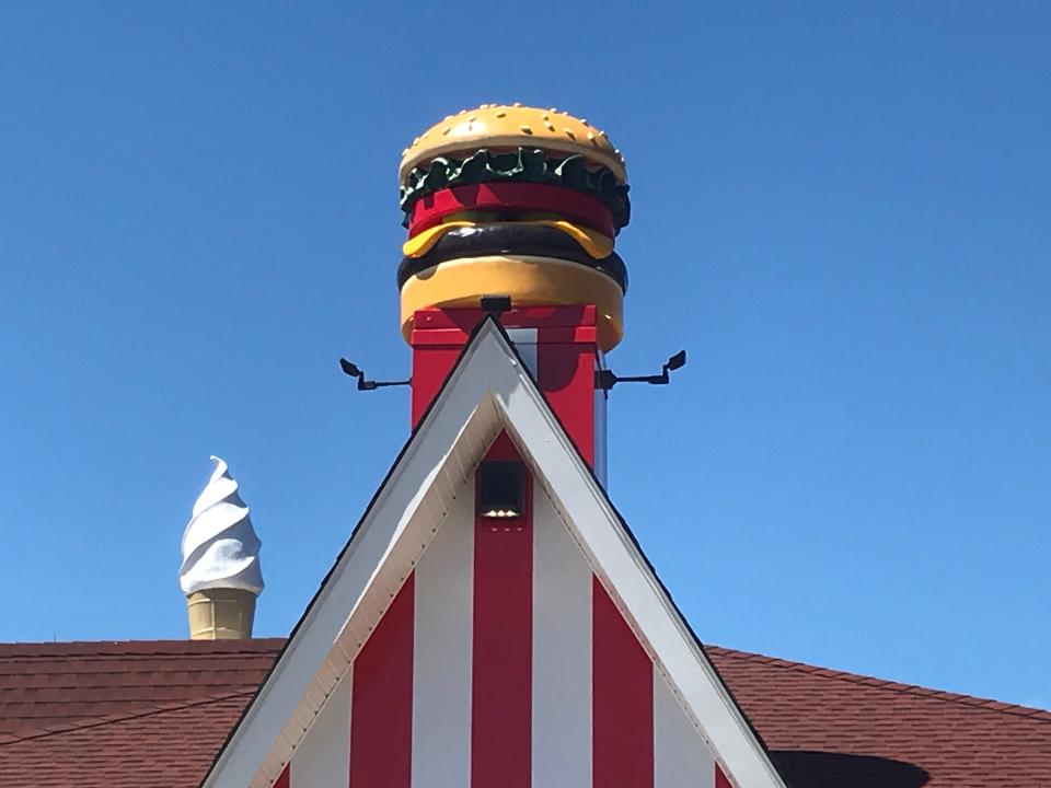 In addition to the large ice cream cone is a new large cheeseburger on top of the Red Rooster in Brewster