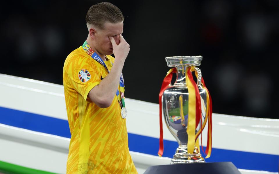 Jordan Pickford pinches his eyes as the tears flow