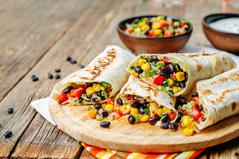 Burritoes on Wooden Platter