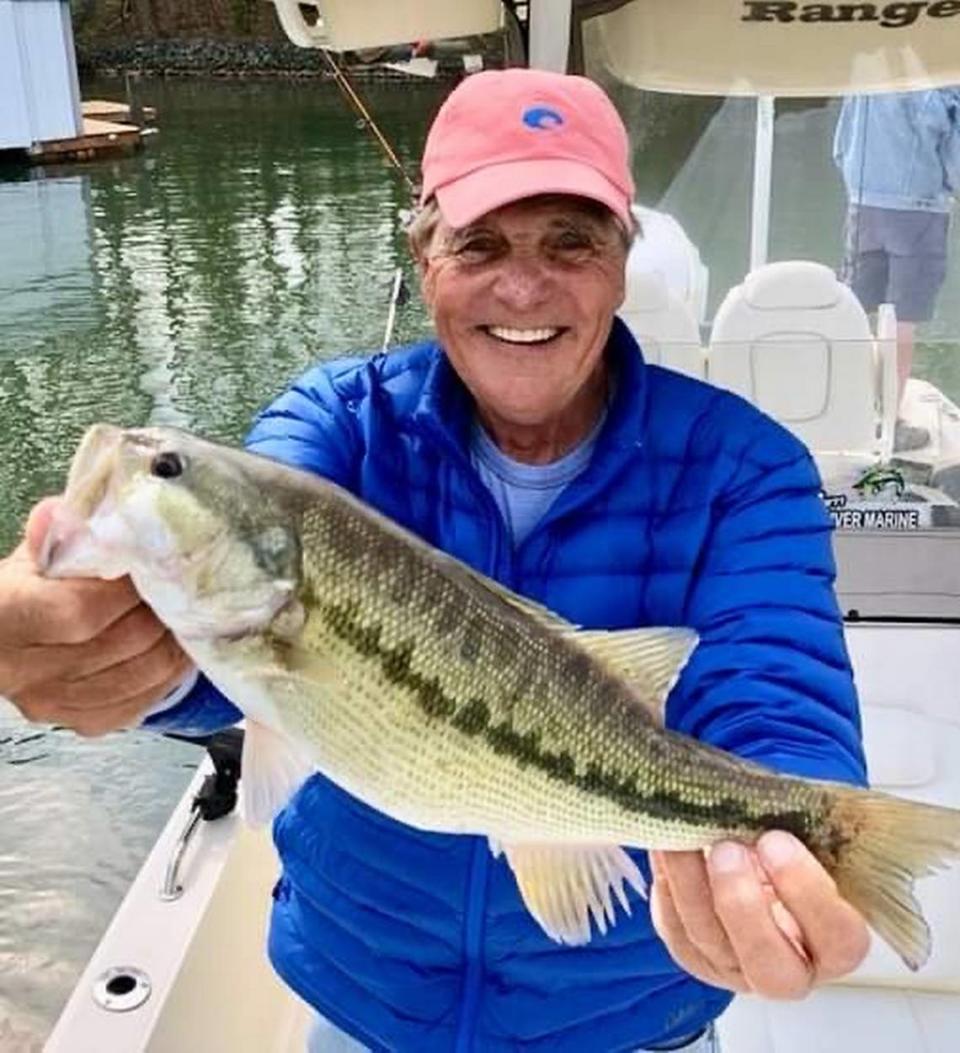 Gus Gustafson holds up a fish he caught on Lake Norman.