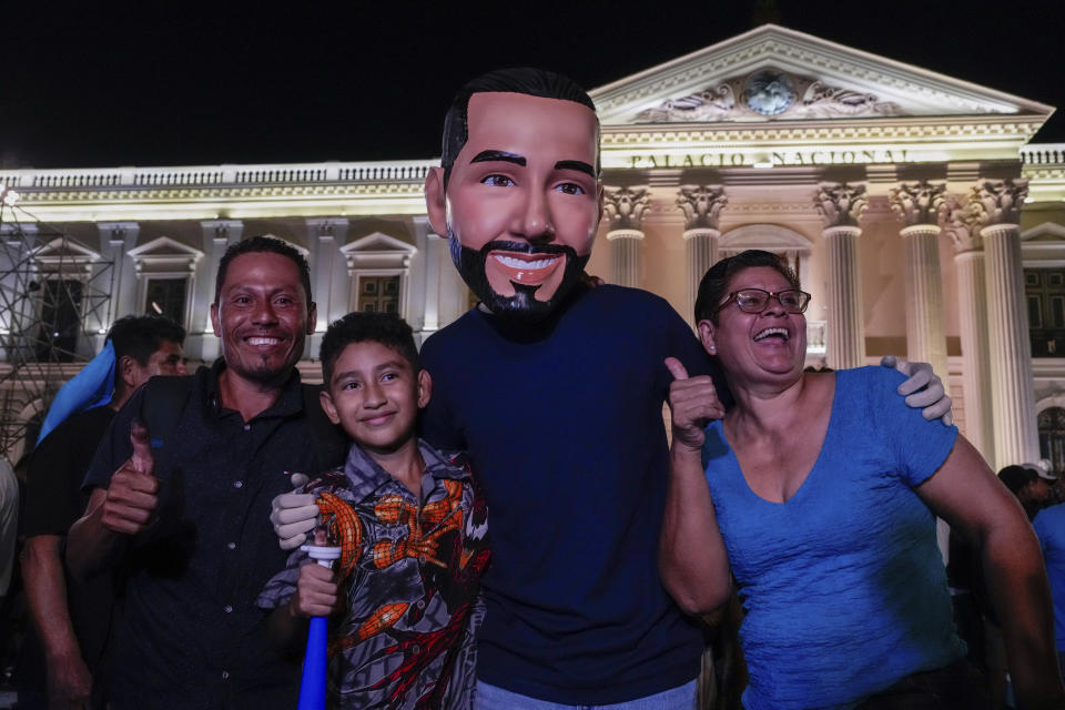 Supporters of Salvador President Nayib Bukele, who is seeking re-election, celebrate results of a general election in downtown San Salvador, El Salvador, Sunday, Feb. 4, 2024. (AP Photo/Moises Castillo)