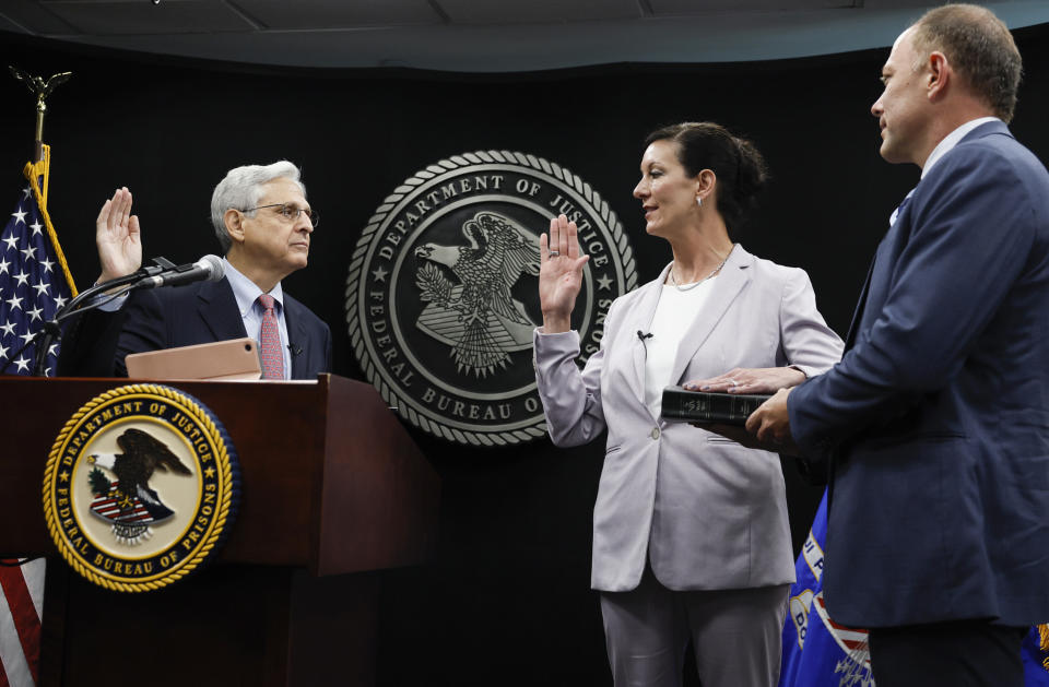 Attorney General Merrick Garland swears in the new director of the federal Bureau of Prisons Colette Peters at BOP headquarters in Washington, Tuesday, Aug. 2, 2022. (Evelyn Hockstein/Pool Photo via AP)