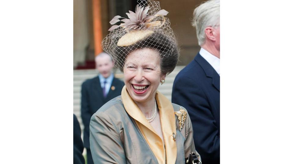 Princess Anne wore her pearl earrings and striking gold brooch to the Buckingham Palace garden party in 2011