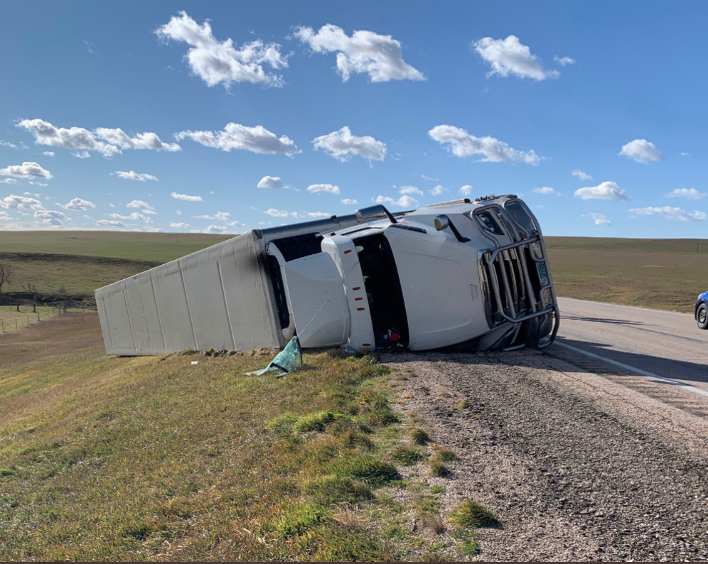 A tipped semi truck on a South Dakota highway on Thursday, Nov. 11.