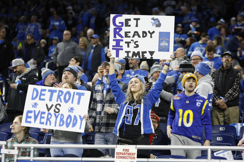Detroit Lions fans cheer during pregame of an NFL wild-card playoff football game against the Los Angeles Rams, Sunday, Jan. 14, 2024, in Detroit. (AP Photo/Duane Burleson)