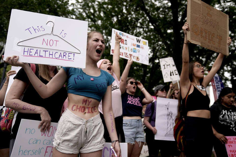 FILE - People rally in support of abortion rights, July 2, 2022, in Kansas City, Mo. A Missouri appeals court on Tuesday, Oct. 31, 2023, ruled against Republican-written summaries that described several abortion-rights amendments as allowing “dangerous and unregulated abortions until live birth.” (AP Photo/Charlie Riedel, File)