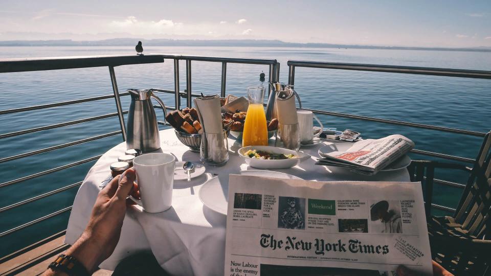 enjoying morning breakfast on a cruise out in the sea