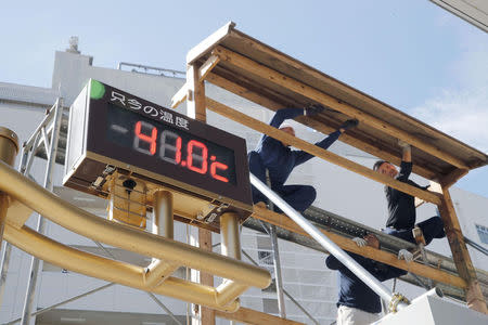 A temperature indicator measures 41.0 degrees Celsius in Kumagaya, north of Tokyo, Japan, in this photo taken by Kyodo July 23. 2018. Mandatory credit Kyodo/via REUTERS