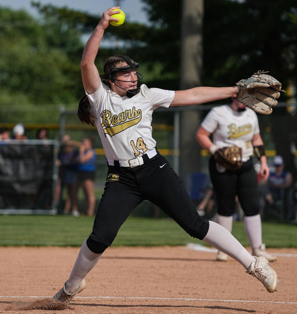 Shelbyville Golden Bears Cheyenne Eads (14) pitches the ball on Tuesday, May 30, 2022, at Shelbyville High School in Shelbyville, Indiana. The Shelbyville Golden Bears defeated Whiteland for the IHSAA Class 4A softball regional championship. 
