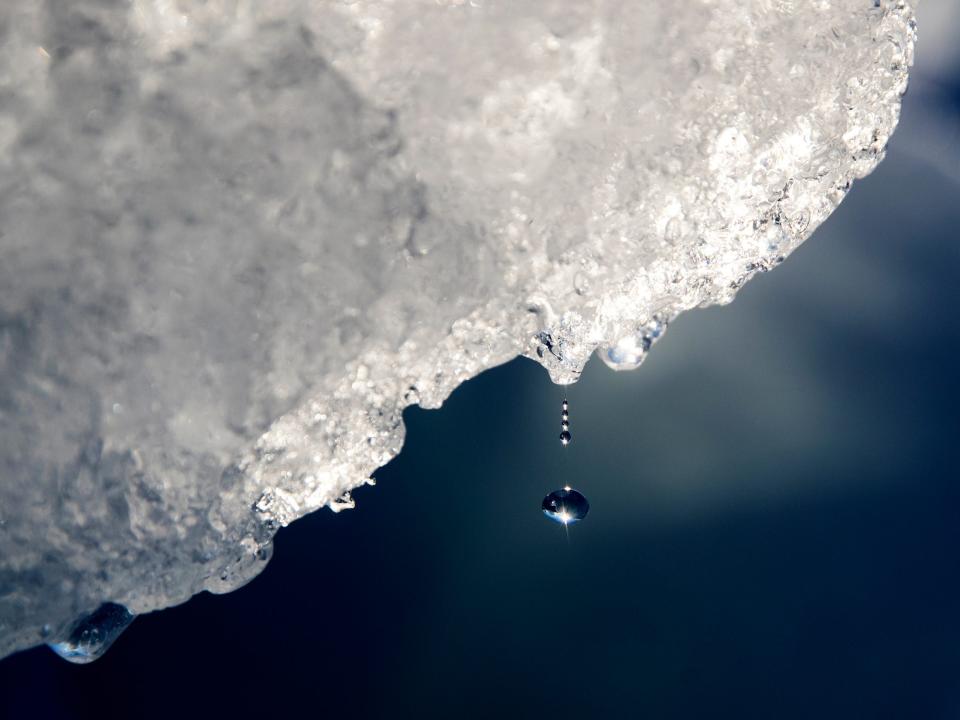water drips from iceberg