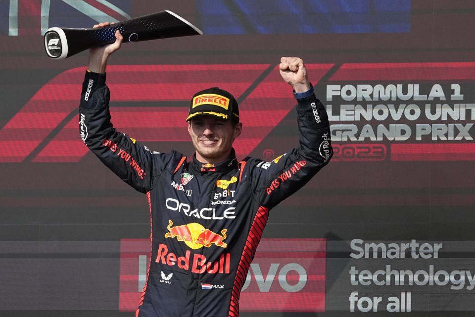 Red Bull driver Max Verstappen, of the Netherlands, celebrates on the podium after winning the Formula One U.S. Grand Prix auto race at Circuit of the Americas, Sunday, Oct. 22, 2023, in Austin, Texas. (AP Photo/Eric Gay)