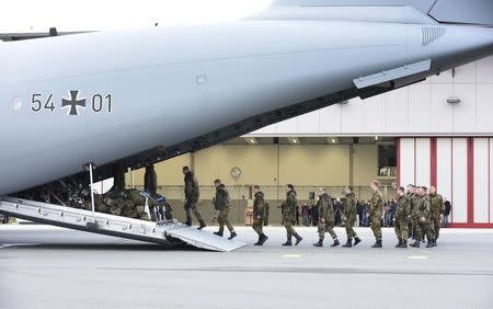 Army personnel board a German airforce Airbus A400M military aircraft at German army Bundeswehr airbase in Jagel, northern Germany December 10, 2015. REUTERS/Fabian Bimmer