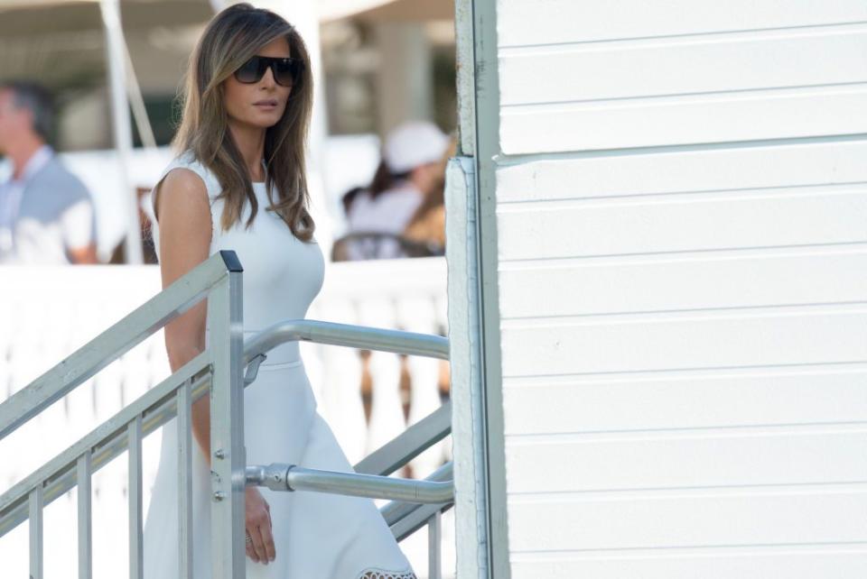 <p>Melania paired a fitted white dress with oversized sunglasses at the Women's Open Golf Championship at <a rel="nofollow noopener" href="https://www.townandcountrymag.com/leisure/travel-guide/g9542605/trump-national-bedminster-things-to-know/" target="_blank" data-ylk="slk:Trump National Golf Course in Bedminster;elm:context_link;itc:0;sec:content-canvas" class="link ">Trump National Golf Course in Bedminster</a> over the weekend. At this point, Trump has visited his family's business properties more than 50 times over the course of his presidency.</p>