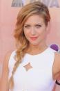 <p>Amp up that teeny-tiny braid by "pancaking." Gently pull at sections of your braid once it's secure to fake a fuller plait, like actress <strong>Brittany Snow's</strong>.</p>
