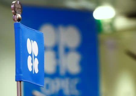 The OPEC flag and the OPEC logo are seen before a news conference in Vienna, Austria, October 24, 2016. REUTERS/Leonhard Foeger